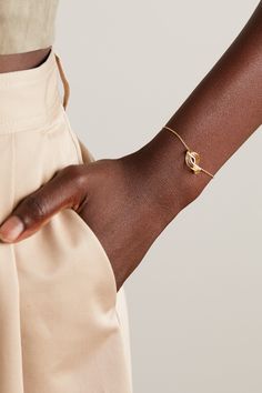 "Inspired by the idea of perspective, the designs echo the introspection of focusing on one’s true self," says ALMASIKA of its 'Terra Nova' collection. This bracelet has an undulating pendant that twinkles with diamonds along its curves. The fine 18-karat gold chain will look elegant alone or stacked with other dainty pieces in your collection. Emerald Bracelet Gold, Gold Diamond Bracelet, The Bling Ring, Latest Bracelets, Terra Nova, Emerald Bracelet, Bracelets Gold Diamond, True Self, Bling Rings