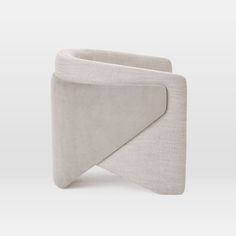 an upholstered chair with a curved seat and backrest, in grey fabric