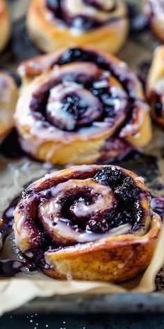 blueberry cinnamon rolls on a baking sheet