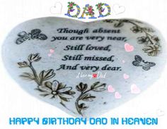 a heart shaped stone with the words happy birthday dad in heaven written on it and butterflies