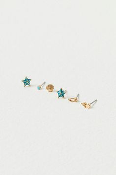 Set of 40 small delicate studs including 13 sets with shimmering stones and 7 sets with fun metal shapes. Easily mix and match to create your unique look. | Teeny Tiny Mega Stud Earring Set by Free People in Blue Starter Earrings, Natural Essence, Cute Stud Earrings, Tiny Studs, Tiny Stud Earrings, Earrings Studs, Natural Face, Jewelry Outfit, Neutral Fashion