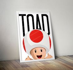 a poster with a mushroom on it that says toad in black and red, against a white wall