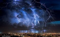 lightning strikes in the night sky over water