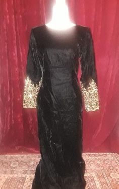 "This is a stunning full length lined black velvet dress from Victor Costa Boutique. Beautiful gold embroidery and sequin embellishments at the cuffs. High neck line with v-plunge in the back. Zipper in  the back. Perfect condition. Labeled as a size 10.  Additional information or pictures provided upon request.  Please be advised this is a vintage item that is pre-owned. Items are sold as-is. Returns and exchanges are not accepted. All sales are final. Items are mailed out using USPS. Items wit Victor Costa, Satin Wedding Gown, Liquid Satin, Black Velvet Dress, Gold Embroidery, Satin Wedding, Pink Satin, Vintage Silk, Dress Clothes For Women