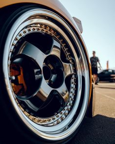 the rims and tires of a sports car