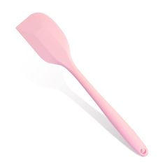 a pink spatula on a white background