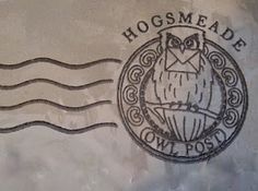 the hogsmeade owl post logo is shown on a cement wall with waves