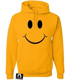 a yellow hoodie with a smiley face drawn on the chest and black eyes,