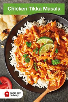 chicken tikka masala served with rice and garnished with cilantro