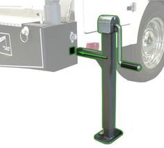 the front end of a white truck with a green handle