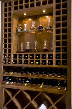 a wine rack filled with lots of bottles