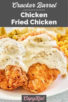 chicken fried in gravy with ranch sauce on top and corn on the side