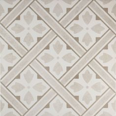 a gray and white rug with an intricate design