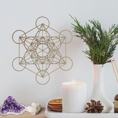 a candle and some decorations on a table