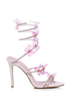 Take flight with The AZALEA WANG Airborne Butterfly Rhinestone Stiletto Sandal In Pink! These whimsical sandals are made from a satiny upper and feature an open almond toe silhouette, a cushioned faux leather insole, rhinestone toe and foot bands with ombré mesh butterflies, a coordinating, coiled rhinestone ankle band, and a stiletto heel.  (All measurements approximate size 7.5): - Textile upper - Open almond toe - Stiletto heel - 4.25” heel height - Imported Product ID: 334263 Glamorous Pink Sandals For Summer, Pink Ankle Strap Sandals For Prom, Pink Heel Strap Sandals For Prom, Pink Sandals For Summer Prom, Spring Prom Sandals In Synthetic Material, Strappy Sandals For Prom In Spring, Strappy Sandals For Spring Prom, Spring Embellished Heels With Ankle Strap, Embellished Ankle Strap Heels For Spring