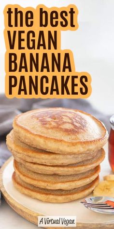 the best vegan banana pancakes are stacked on a plate with syrup in front of them