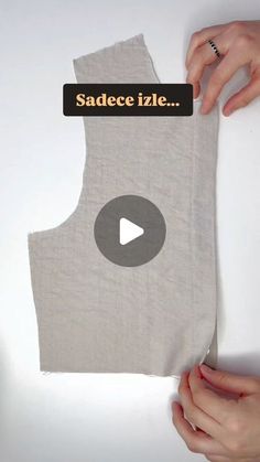 someone holding up a piece of fabric with the words sadecize me on it