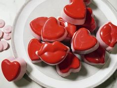 red and white heart shaped cookies on a plate