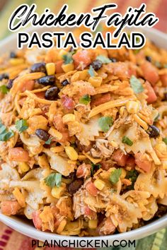 chicken fajita pasta in a white bowl with text overlay