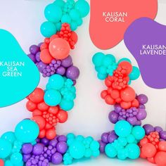 colorful balloons are arranged in the shape of letters