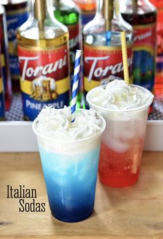 there are two drinks with ice cream on the top and one is red, white, and blue