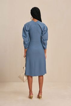 A knee-length knit dress with a tunneled sleeve detail that gathers at the V-neckline.- Stretch fit- V-neck- ¾ length voluminous sleeve- Knee-length Cult Gaia, Deep Sea, Sleeve Detail, Lifestyle Brands, Kid Shoes, Knit Dress, Clothing And Shoes, Knee Length, Hollywood