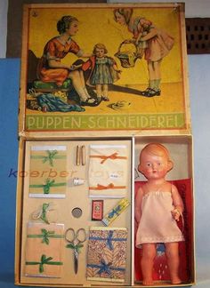 a doll in a box with its contents