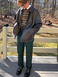 masculine person wearing a brown leather jacket sweater dickies dark green pants and black loafers Cool Masculine Outfits, Fall Masculine Outfit, Masculine Date Outfits, Poet Core Outfits, Collared Sweater Outfit Men, Masc 80s Outfits, Preppy Nonbinary Outfits, Adrogonus Outfits Men, Librarian Style Men