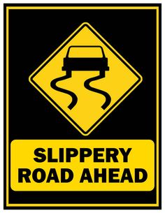 a slippery road ahead sign is shown