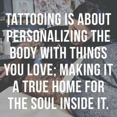 a woman laying on top of a bed next to a wall with the caption tattooing is about personalizing the body with things you love, making it a true home for the soul inside