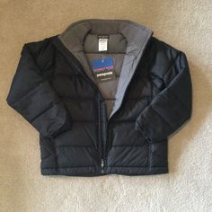 Patagonia Black Down Jacket Boys Medium New With Tags Patagonia Long Sleeve Puffer Jacket For Winter, Patagonia Casual Black Outerwear, Casual Black Patagonia Outerwear, Black Casual Patagonia Outerwear, Patagonia Black Outerwear For Hiking, Patagonia Nylon Puffer Jacket For Winter, Patagonia Long Sleeve Winter Puffer Jacket, Midweight Fleece Lined Patagonia Jacket, Black Patagonia Jacket