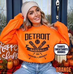 Please read the description completely and review all photos before ordering. Our Detroit Baseball Apparel is the perfect way to cheer on the home team this season. Ideal for game day, tailgates or everyday wear. Makes a great gift for any fan. This listing is for the distressed design. Click the link below for the non-distressed version: https://tandtapparel21.etsy.com/listing/1672213846/vintage-style-detroit-baseball-t-shirt SHIRT DETAILS Bella Canvas Unisex - Solid colors: 100% Cotton. - Heather colors: 52% Cotton + 48% Polyester - Runs true to size. (For looser or oversized fit consider going up a size or 2. See photos for size chart.) SWEATSHIRT & HOODIE DETAILS Gildan Heavy Blend Unisex - 50% Cotton + 50 Polyester - Runs true to size. (For looser or oversized fit consider going up a Pre-shrunk School Spirit Hoodie For Sports Season, Sports Fan Long Sleeve T-shirt For Baseball Season, Long Sleeve Sports Fan T-shirt For Baseball Season, Team-colored Sweatshirt For Sports In Fall, Team-colored Fall Sports Sweatshirt, Collegiate Winter T-shirt For Streetwear, Team Spirit Sports T-shirt For Fall, Fall Sports Fan Hoodie With Letter Print, Sports Fan Letter Print Hoodie For Fall