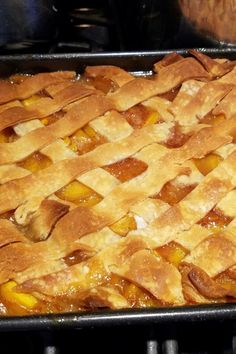 a pie sitting on top of a metal pan