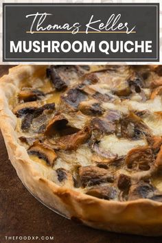 Thomas Keller's mushroom quiche featuring a golden, flaky crust filled with creamy custard and sautéed mushrooms, garnished with fresh herbs for a gourmet touch.