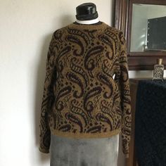 "Cozy women's 70s vintage paisley pullover sweater.  Casual, comfortable, and warm crew-neck and straight fit by Kandahar Deluxe. \"Wash Without Worry\" 100% acrylic.  Listed as ladies size M, but please see listed measurements for accurate sizing.   All measurements are taken with item laying flat. Bust: 19in Shoulder to hem length: 22.5in Shoulder to cuff length: 23.5in" 70s Maxi Dress, Vintage Paisley, Madras Plaid, Beaded Clutch, Pullover Sweater Women, 70s Vintage, Women Pullover, Liz Claiborne, Pullover Sweater