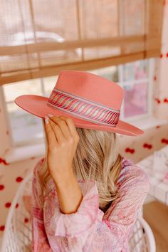 Make a statement in our eye-catching pink 'Make Amends' fedora featuring lightweight wool material, a curved 3-inch brim, and a wide serenity hued embroidered accent band! Hat Dimensions: Length - 15.5 Inches Width - 14.5 Inches Height - 5 Inches Cranial Circumference - 23 Inches Fitted Wide Brim Felt Hat For Spring, Spring Fitted Wide Brim Felt Hat, Pink Fitted Brimmed Fedora, Fitted Pink Brimmed Fedora, Pink Curved Brim Felt Hat For Kentucky Derby, Pink Felt Hat With Curved Brim For Kentucky Derby, Spring Fitted Felt Hat With Flat Brim, Spring Felt Hat With Flat Brim, Pink Fedora With Curved Brim