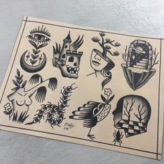 an old school tattoo design on a piece of paper with some other tattoos in it