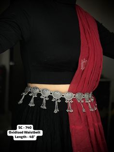 Indian Silver Ghungroo Kamarpatta oxidised Waistbelt for Women Elegant & Stylish Belly Chain for Weddings Adjustable Boho Kamarband These stylish Oxidized Waistbelt from VASTRABHUSHAN will certainly leave you spellbound. These Kamarband have an excellent finish and gives out an exquisite sense of style. If you are looking for an amazing Fashion Jewelry for special occasions such as Anniversary, Engagement, Party, Wedding or for gifting , then your search ends here. The look is stunning and preci Cheap Silver Jewelry With Latkans, Oxidised Kamarband, Traditional Silver Choli With Pallu, Traditional Silver Choli For Diwali, Traditional Silver Choli For Party, Traditional Bridal Belt With Tilla For Party, Traditional Tilla Bridal Belt For Party, Silver Choli For Navratri Festival, Traditional Silver Dupatta For Navratri