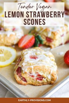 lemon strawberry scones on a tray with strawberries