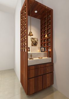 a bathroom with a sink, mirror and shelving unit in the corner that is made out of wood