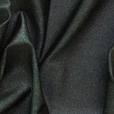 the black fabric is very soft and shiny