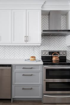 a stove top oven sitting inside of a kitchen