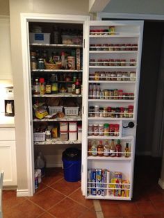 an open pantry with lots of food in it