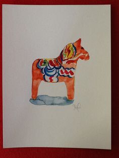 a watercolor drawing of a toy horse on white paper with red border around it