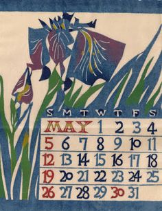 a blue and white calendar with flowers on it