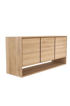 Inspired by the Scandinavian charm, the Solid Oak Minimalist Sideboard by Ethnicraft is characterized by clean lines and a minimalist aesthetic, making it a versatile addition to various interior styles. This Nordic sideboard showcases doors that reveal ample storage space for your everyday essentials. It's crafted with durable oak in lustrous hard wax oil finish which adds a layer of protection to preserve its pristine condition. Solid oak Oiled finish Features 2- 4 doors depending on the chose Nordic Sideboard, Minimalist Sideboard, Solid Oak Furniture, Buffet Cabinet, European Furniture, Wood Sideboard, Oak Furniture, Soft Close Doors, Minimalist Aesthetic