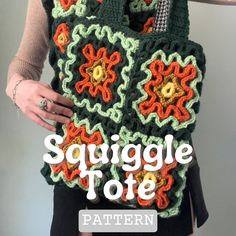 a woman is holding a crocheted bag with the words squiggle tote written on it