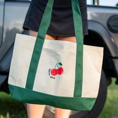 This trendy & unique Cherry On Top Sorority Tote Bag is perfect for big little gifts, initiation gifts, bid day bag gifts, etc! Grab one for you, your big/little, or a group of sisters Picture Details ⭑ #1-3: Forest Green tote bag ⭑ Thread colors cannot be changed! Care Instructions ⭑ Wash separately on cold to ensure colors do not bleed ⭑ Care instructions are included with every order. We are not responsible for damages if not cared for properly. Tote Bag Info ⭑ Premium 11 ounce cotton canvas Bid Day Bags Gifts, Bid Day Bags, Little Baskets Sorority Ideas, Initiation Gifts, Little Gifts Sorority, Letter Canvas, Bid Day Gifts, Big Little Basket, Alpha Gam