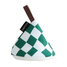 a green and white checkered triangle shaped object with a tag on it's side