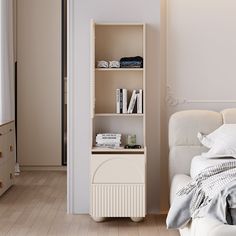 a bedroom with a white bed and bookcase